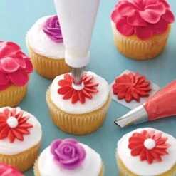 Wilton Starter Decorating Tip - Set Of 9 -Dream Cake Shop wilton starter decorating tip set of 9 p18883 67476 image